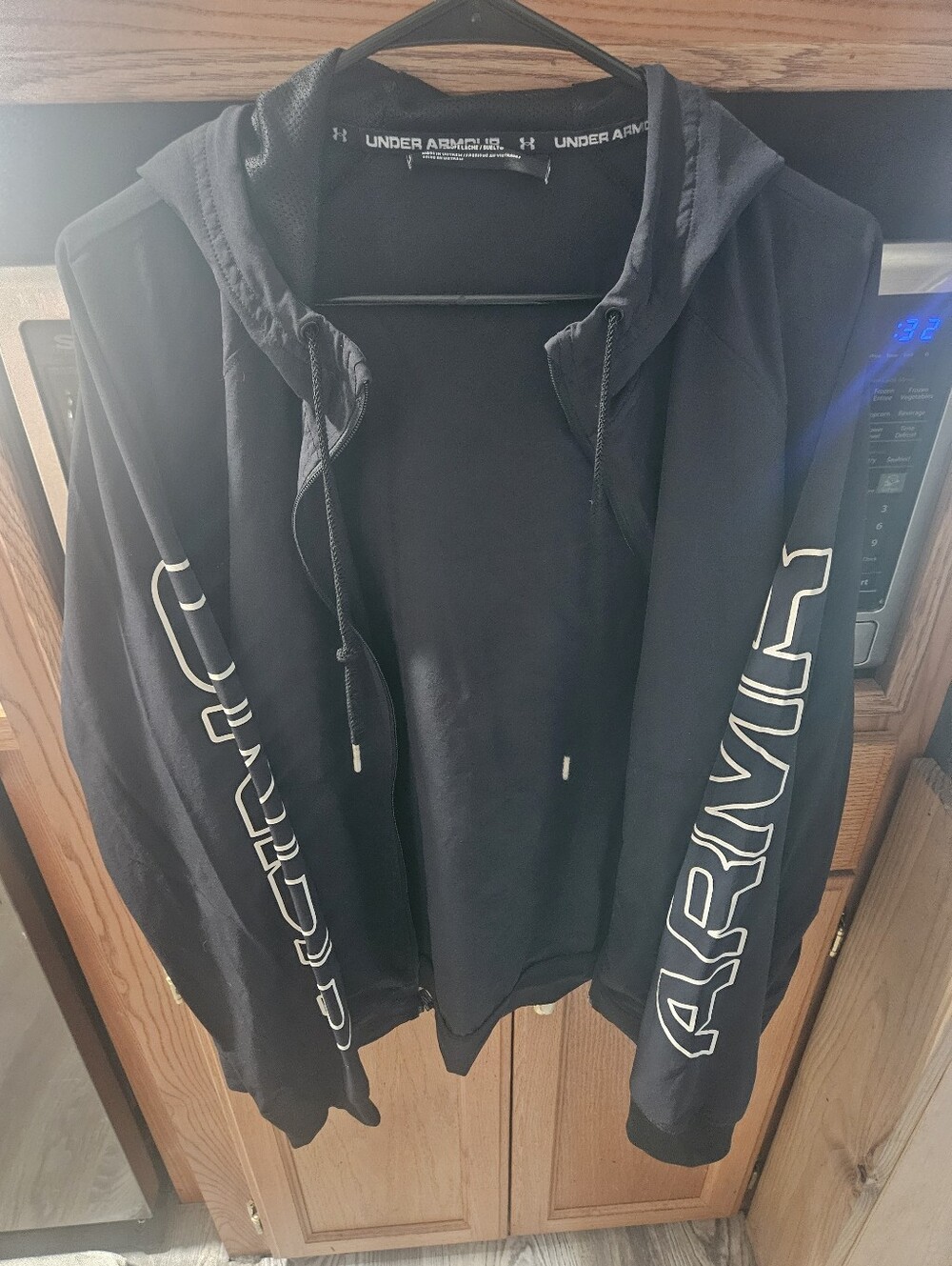 Under Armour Black Hoodie with White Sleeve Lettering